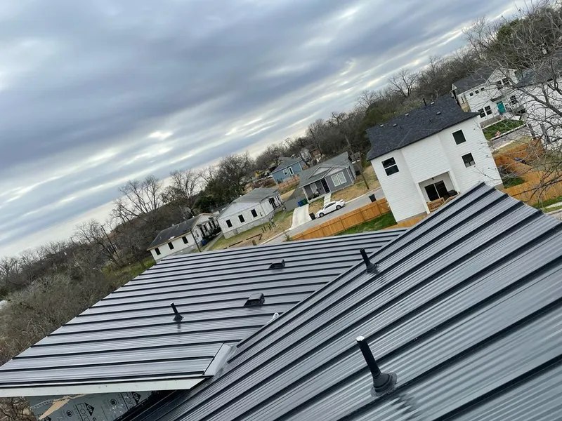 Standing seam metal roof panels with vents for Skylight Repair in Girard